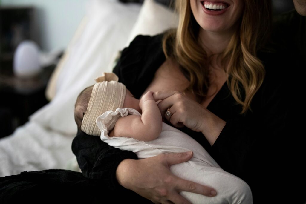 breastfeeding mom with baby